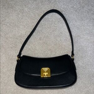 Elegant Black Shoulder Bag with Gold Accent
